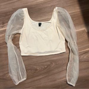White cropped long sleeve with see thru sleeves